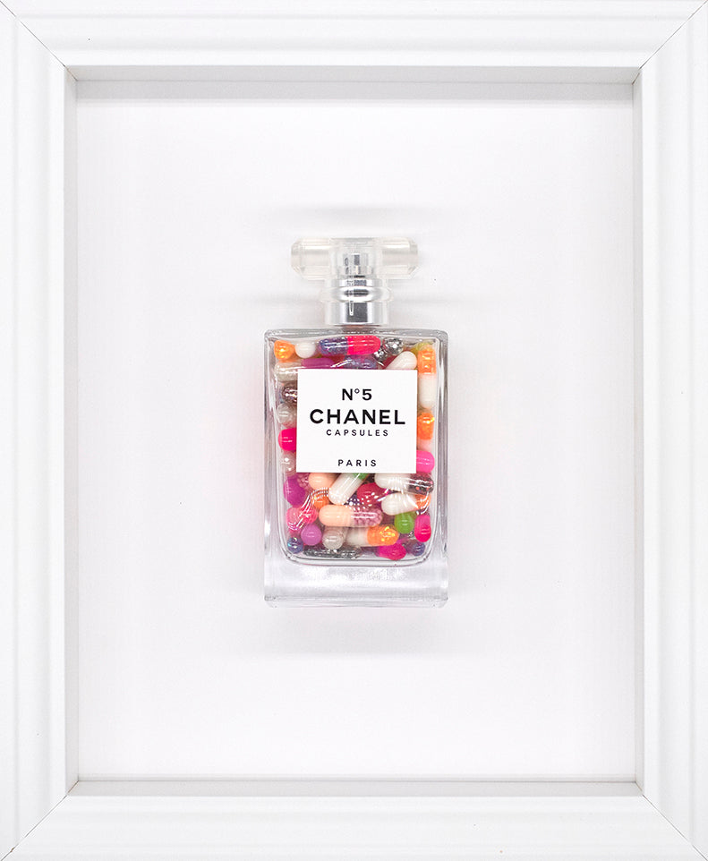 Emma Gibbons - 'Chanel No.5 Capsules- White Frame' - Framed