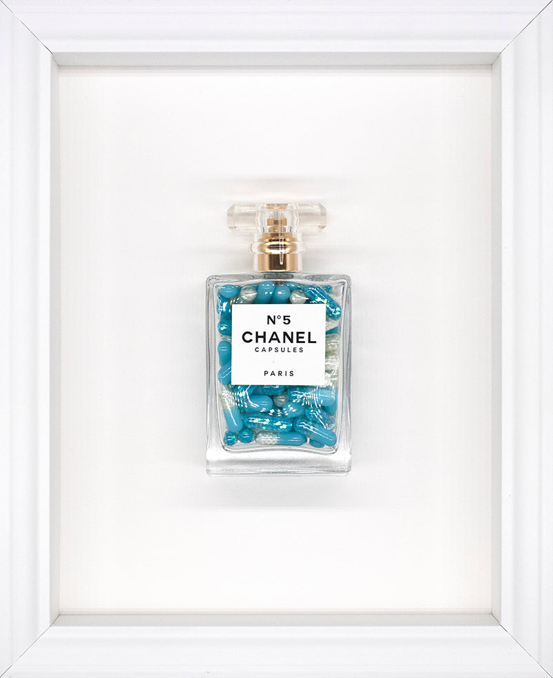 Emma Gibbons - 'Chanel No.5 Capsules- White Frame' - Framed